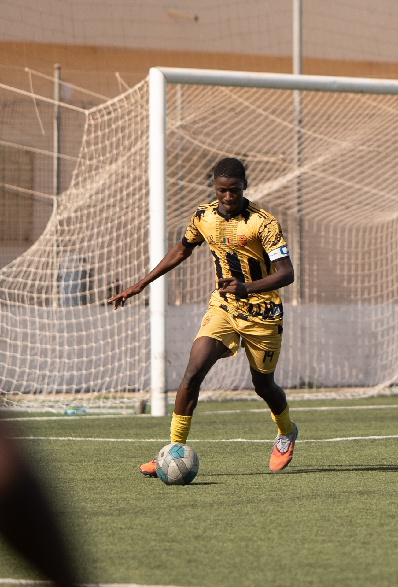 Joueur TEAM BS en action avec le ballon